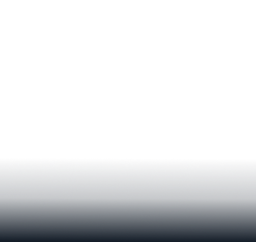 Woman smiles looking in the mirror getting a haircut.